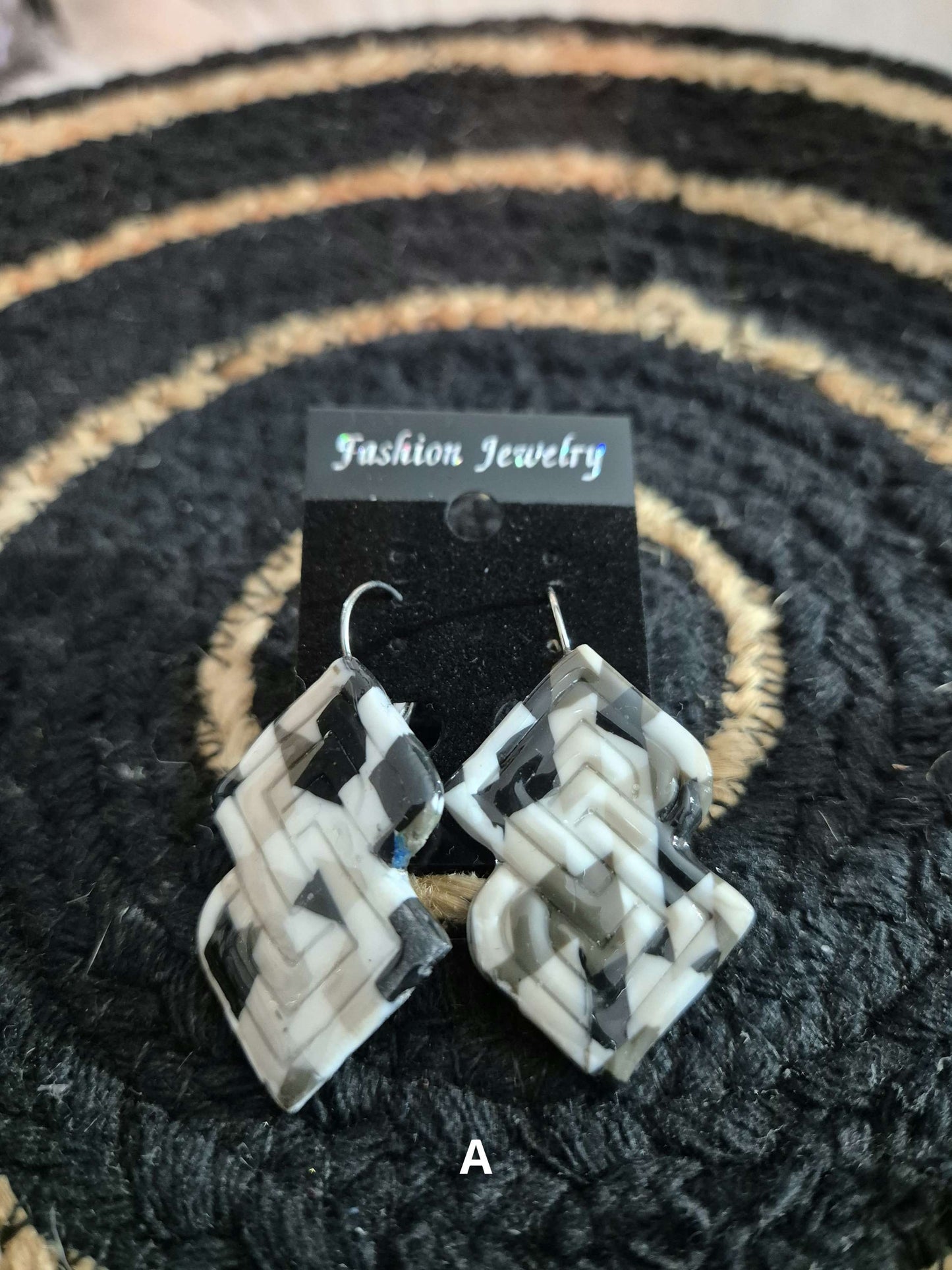 600. Boucles d'oreilles "As de carreaux"