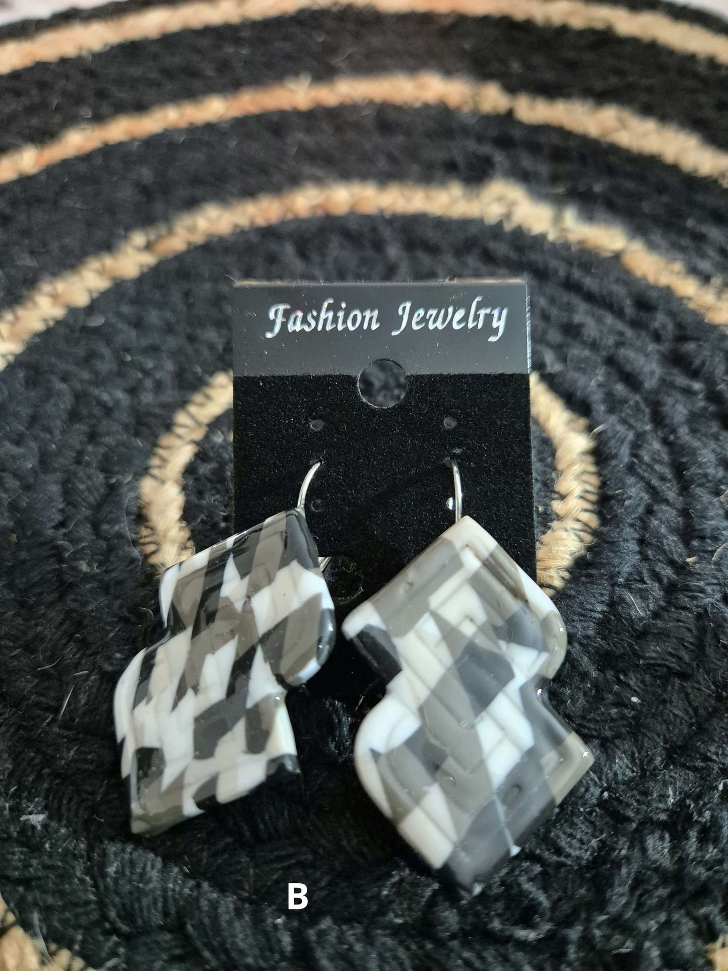 600. Boucles d'oreilles "As de carreaux"