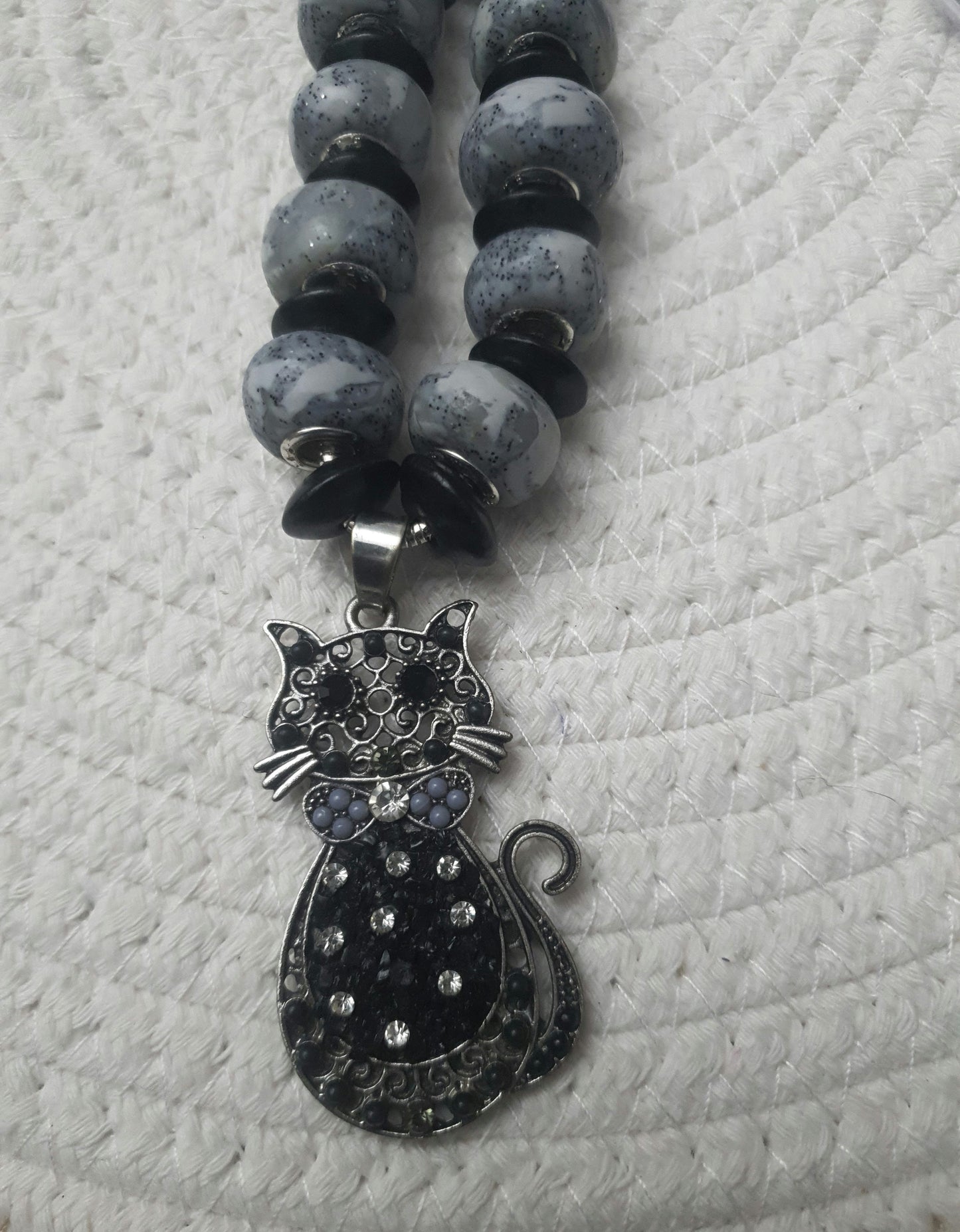 137. "Sautoir le Chat "