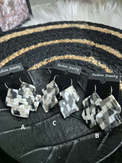 600. Boucles d'oreilles "As de carreaux"