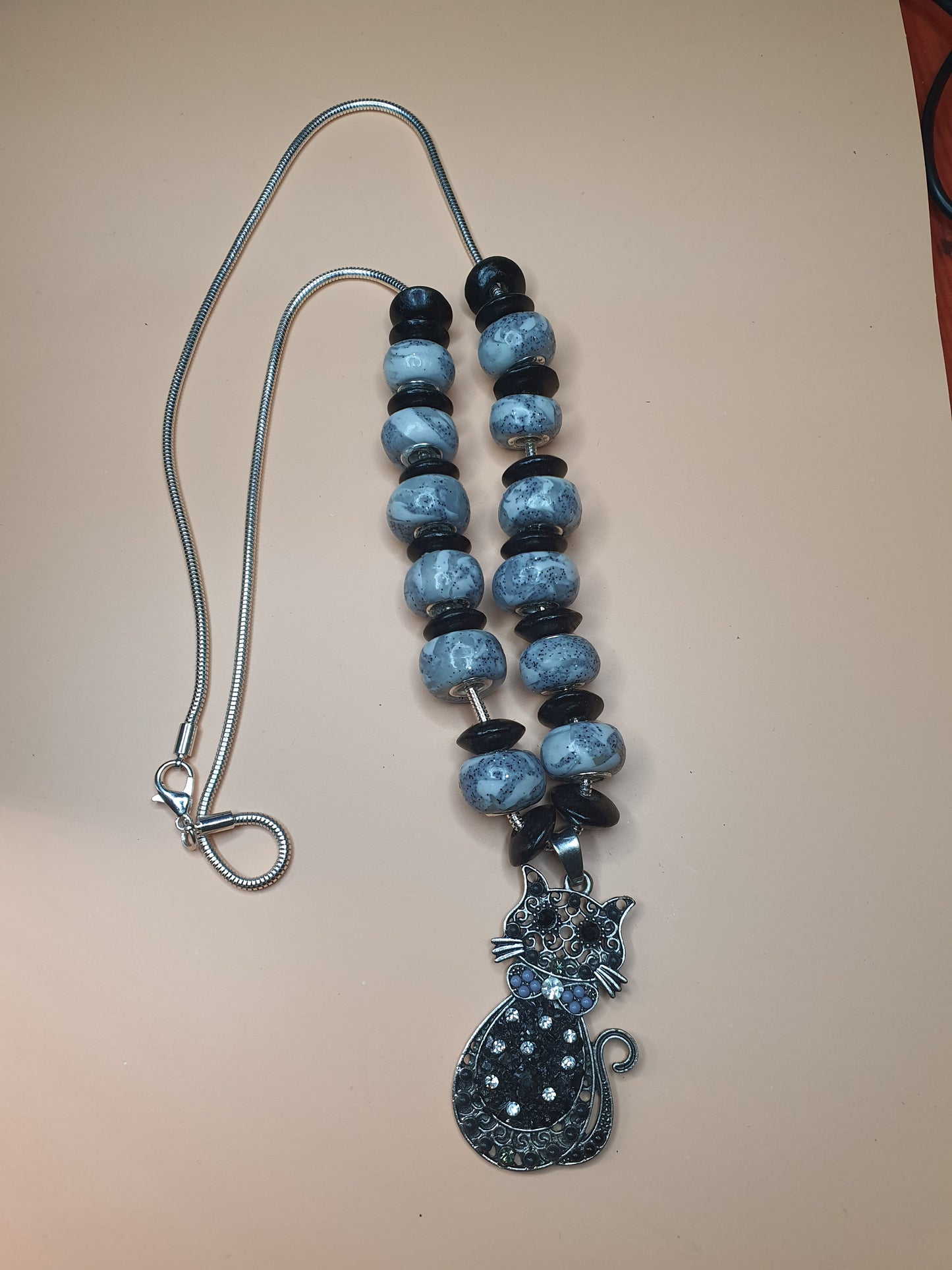 137. "Sautoir le Chat "